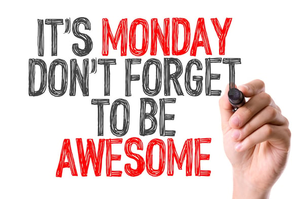 Hand with marker writing Its Monday Don't Forget to be Awesome
